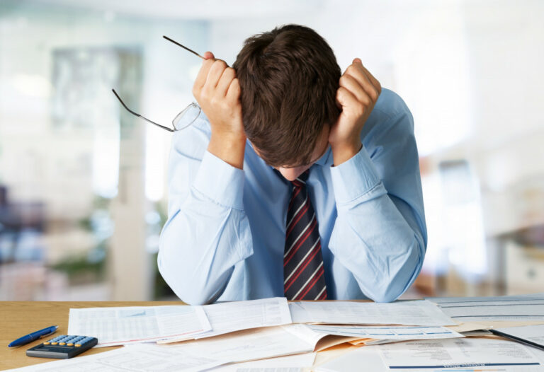 entrepreneur feelign stressed while working
