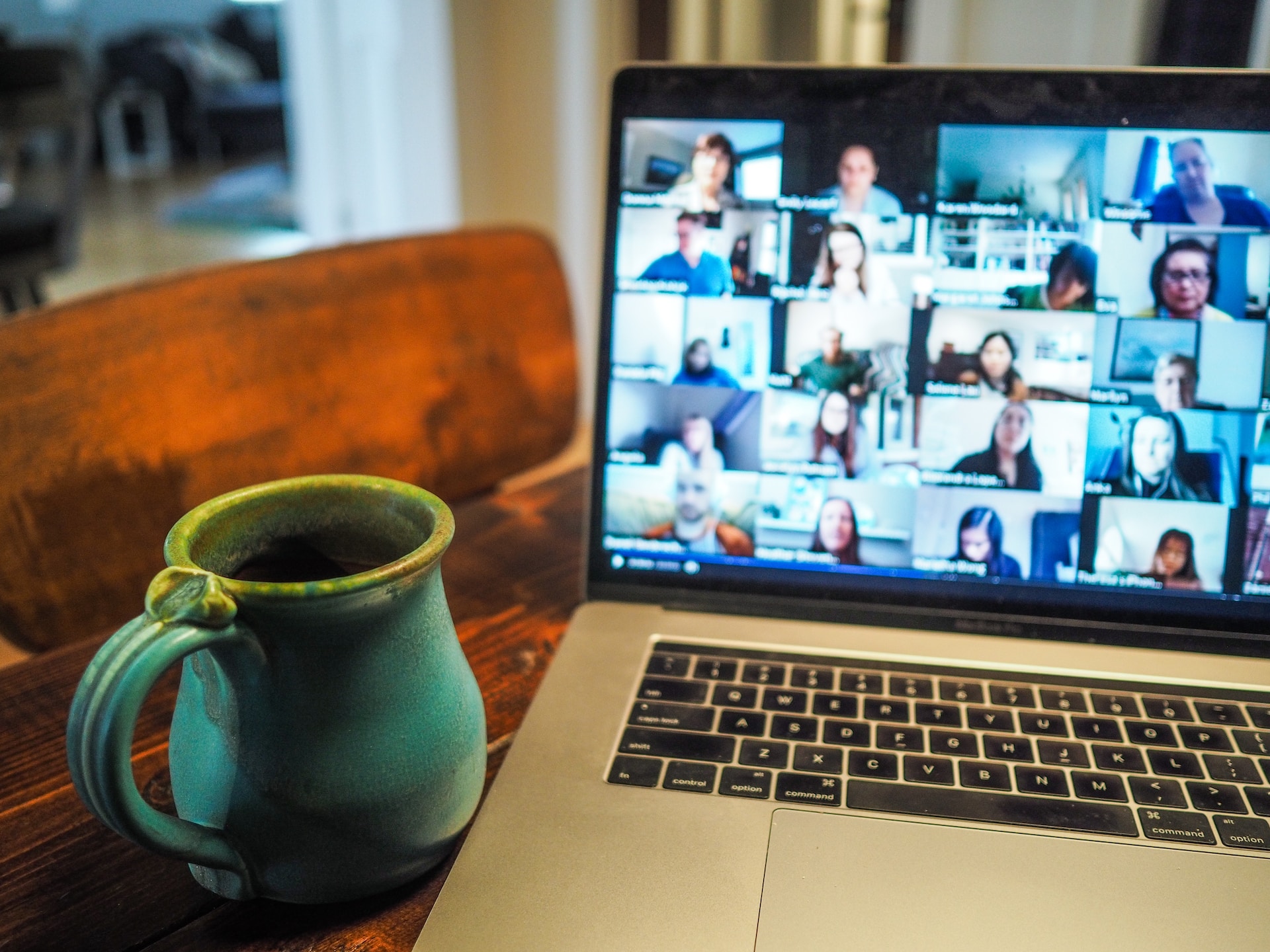 Laptop displaying an online meeting